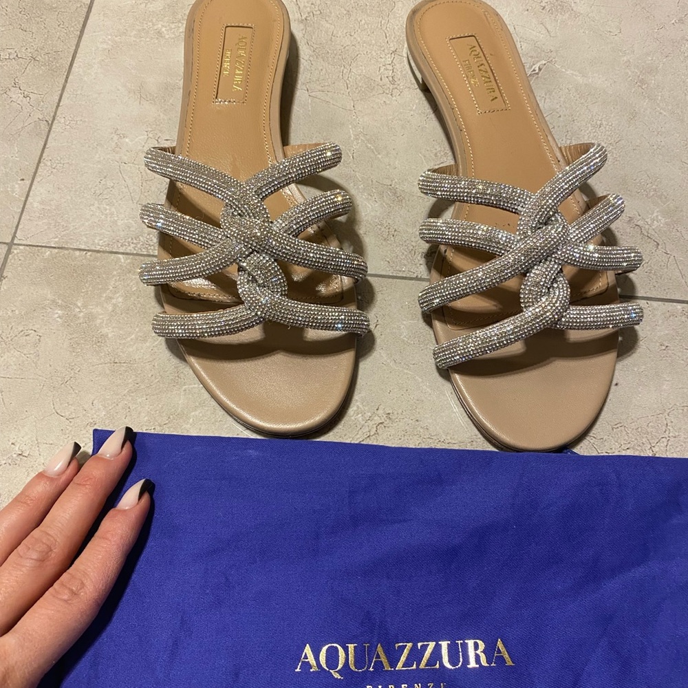 AQUAZZURA
LEATHER MOONDUST SANDALS WITH RHINESTONE EMBELLISHED